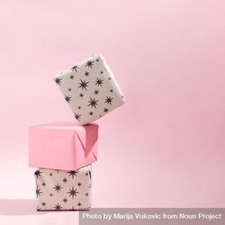 Christmas present concept idea on soft pink background with shadow 5QpVn0