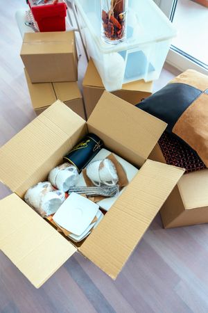 Living room with stack of moving boxes