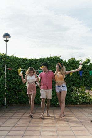 Group of friends having a pool party