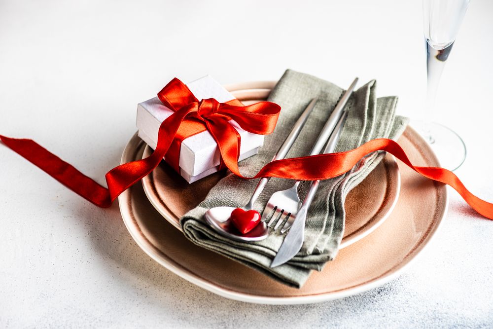 Valentine's Day themed dinner setting with copy space