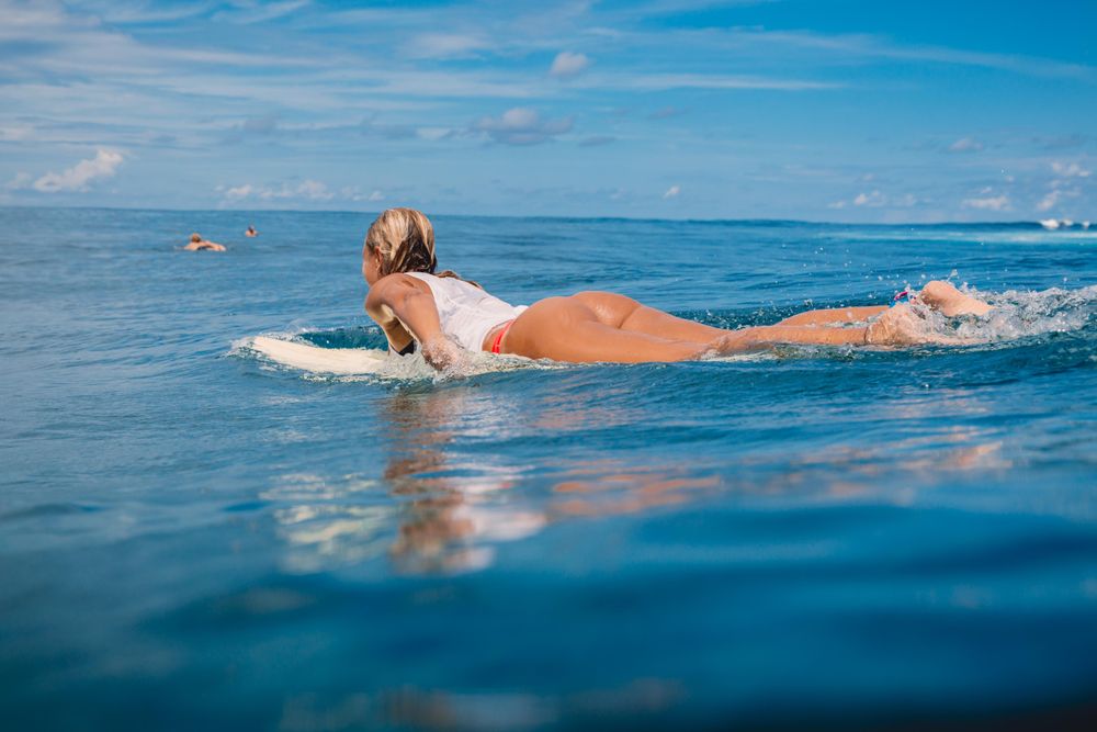 Woman on a surfboard