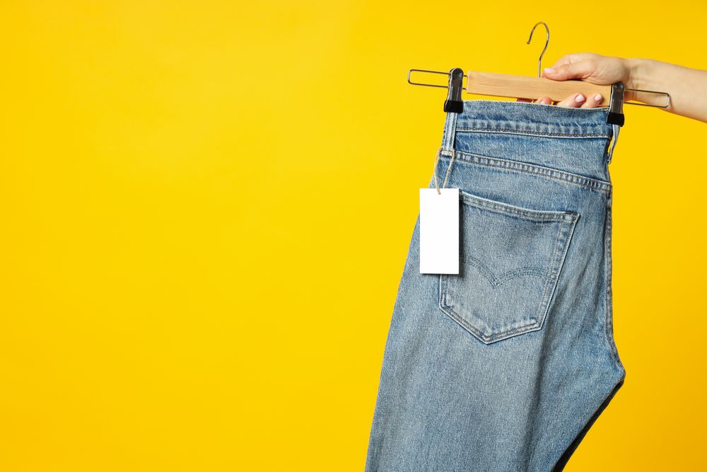 Jeans with tags on hangers