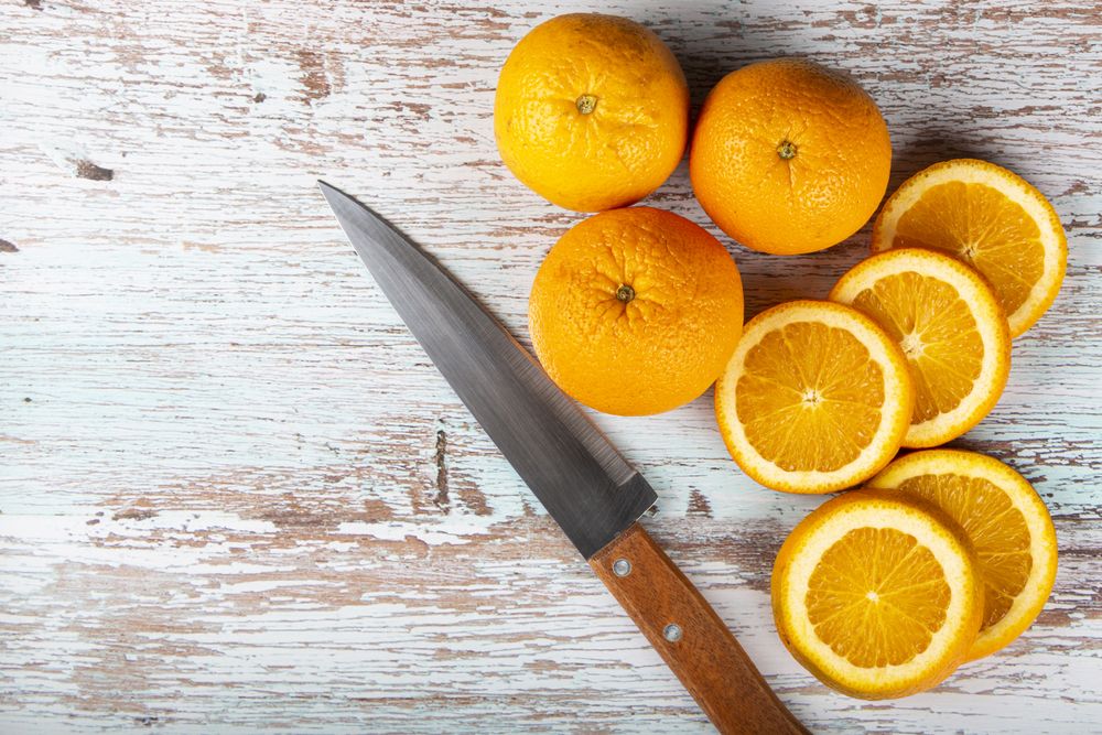 Sliced oranges on the table.