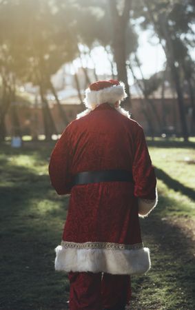 Santa Claus walking in park