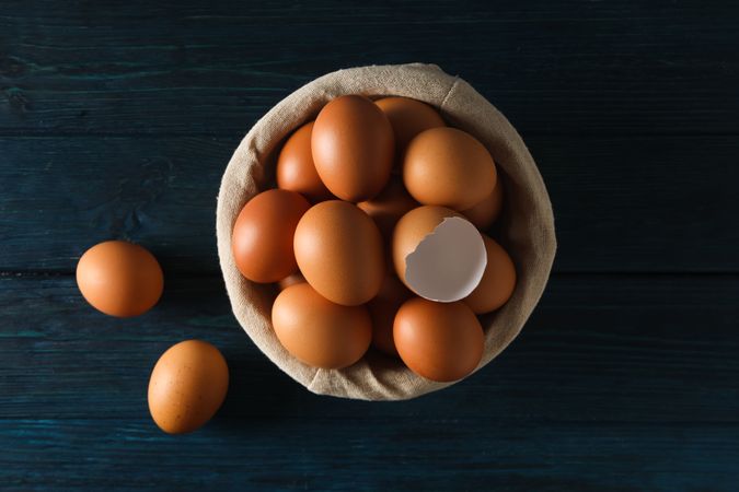 Concept of fresh and natural farm product - eggs, top view
