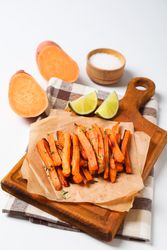 Concept of tasty food - sweet potato fries