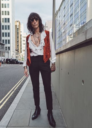 London, England, United Kingdom - September 18 2021: Man dressed in 70s style clothes on street