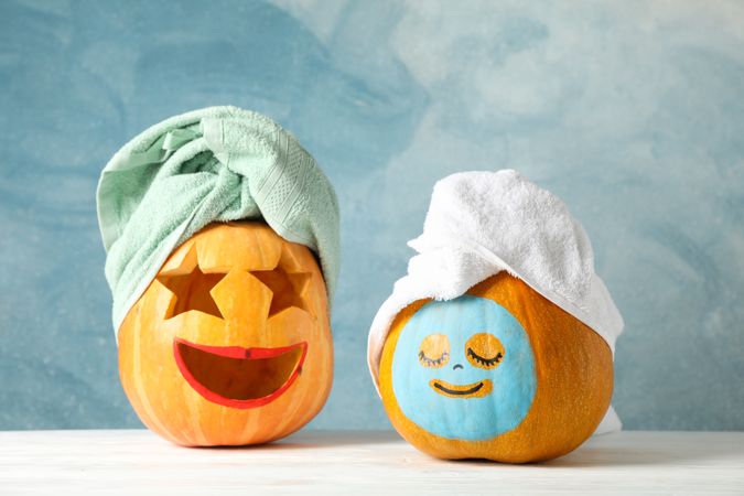 Funny pumpkins with towels with space for text