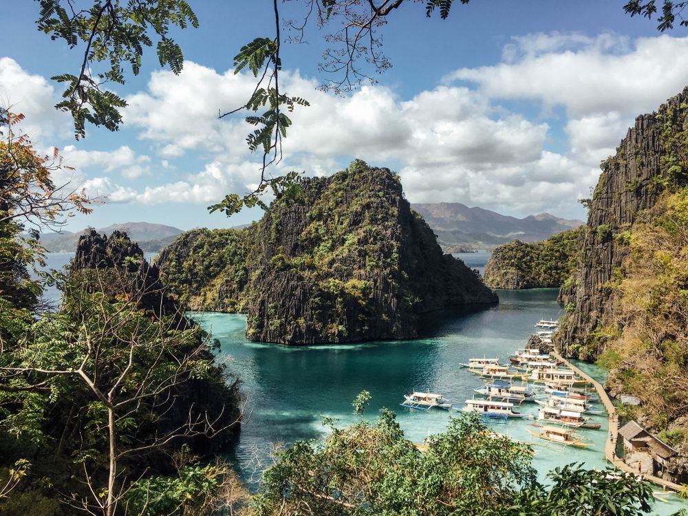 Aerial view of boat on seashore at Coron Island in Philippines