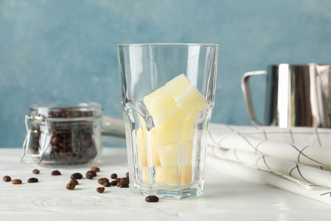 Composition with ice coffee on wooden background