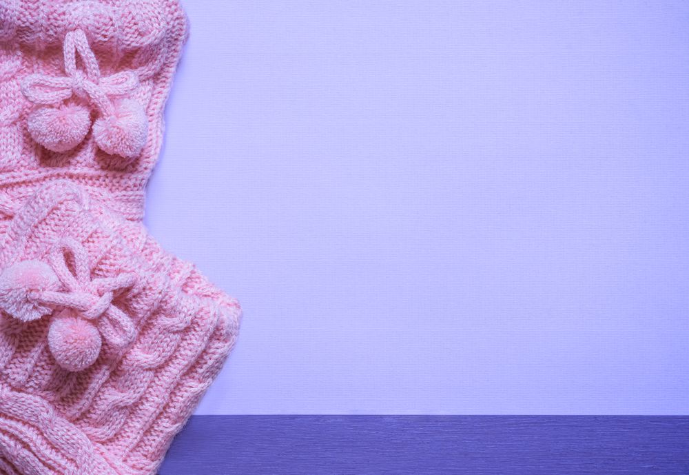Close up with booties on purple paper