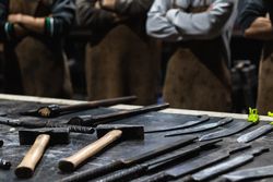 Different metal sharp tools at workbench