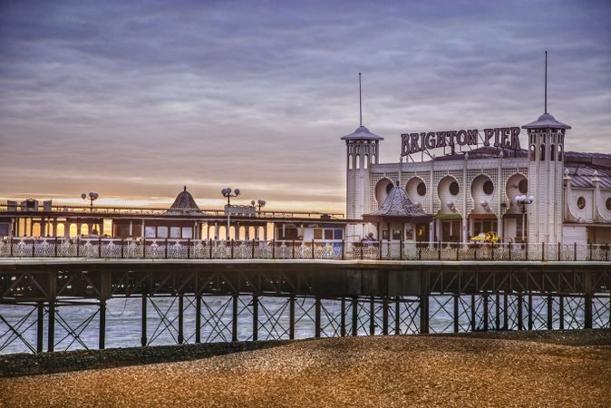 Ornamental building on pier in evening