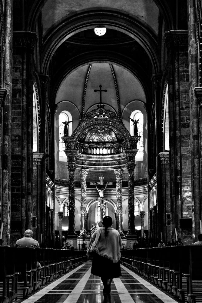 Back of woman walking into church