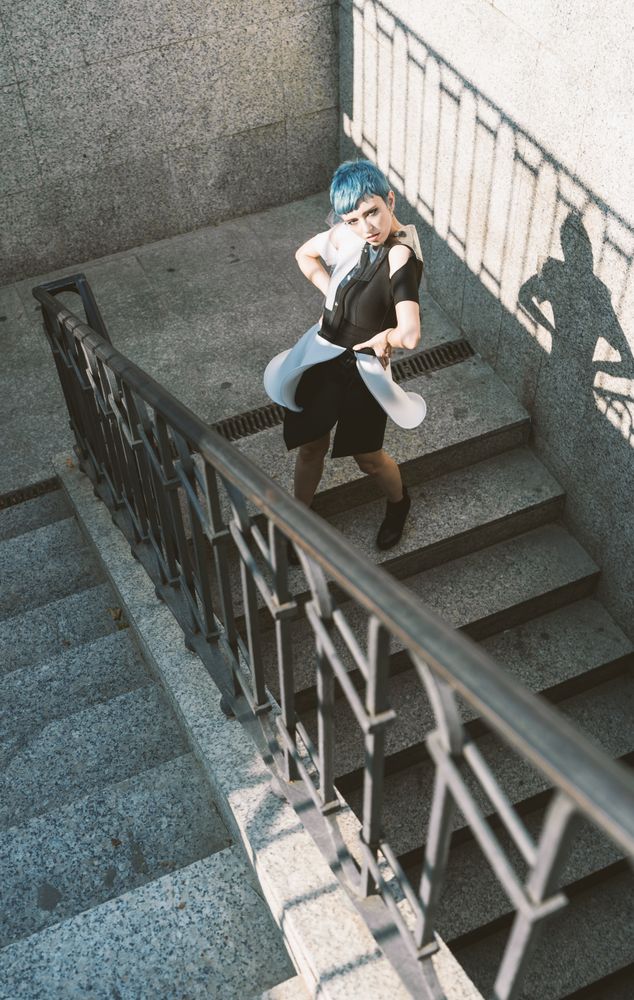 Sensual futuristic model posing on stairs