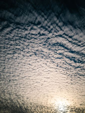 Picturesque cloudy sky at sundown