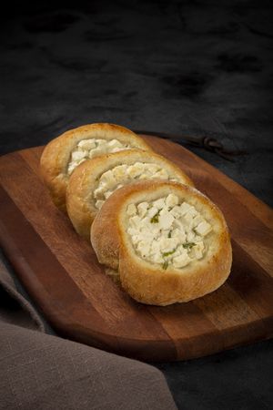 Arabic cheese sfiha on the table.