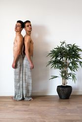 Stylish shirtless gay couple posing