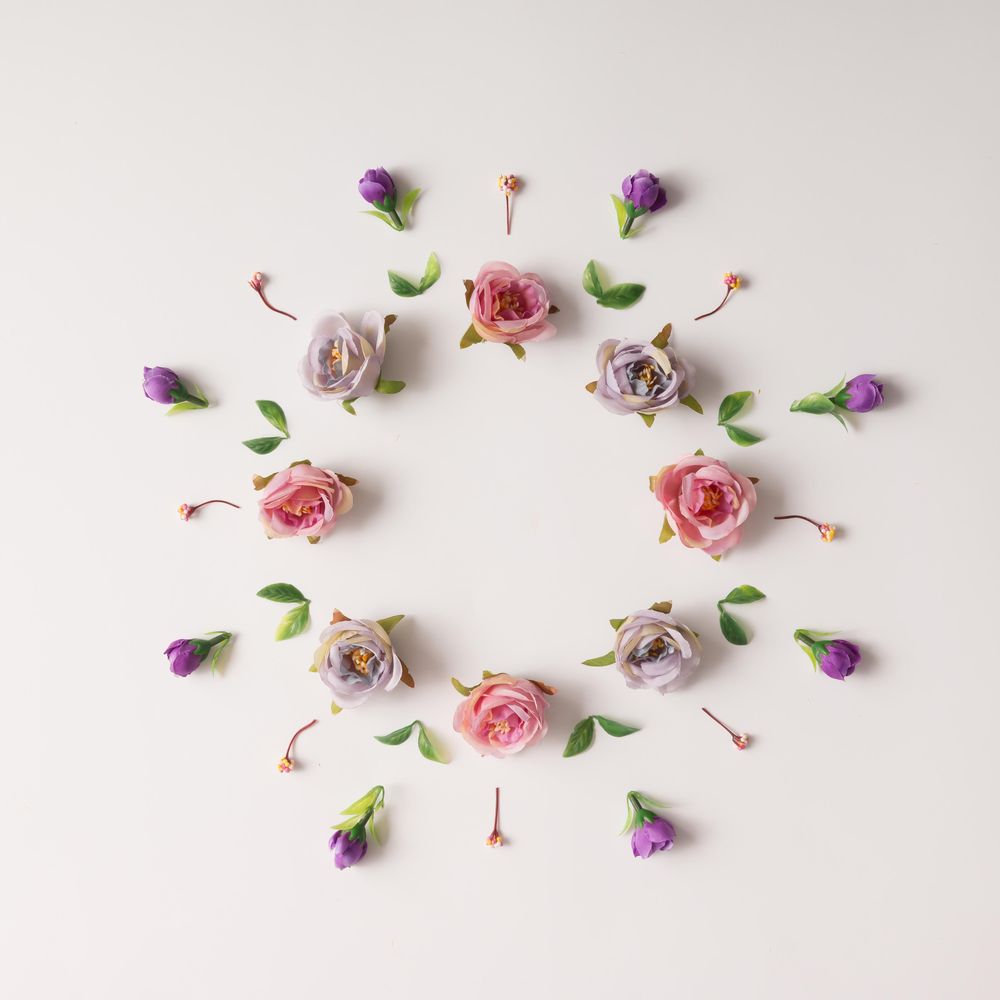 Circular flower arrangement on light background