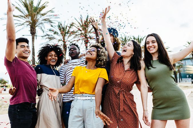 Young multiracial people having fun in summer party celebration