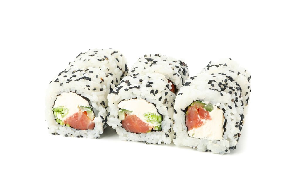 Japanese food. Delicious sushi rolls isolated on light background