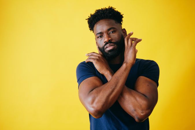 Portrait of Black man with arms crossed over his chest