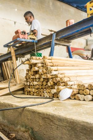 Heap of wooden sticks at workplace