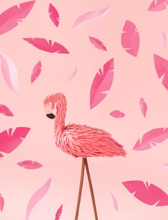 Pink flamingos on pink background, with pink leaves