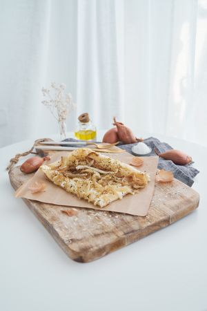 Onion pastry puff on table