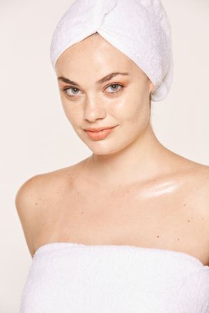 female with radiant body after cosmetic procedure