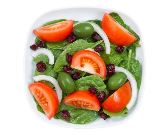 Close up Top View of Fresh Salad in plate isolated