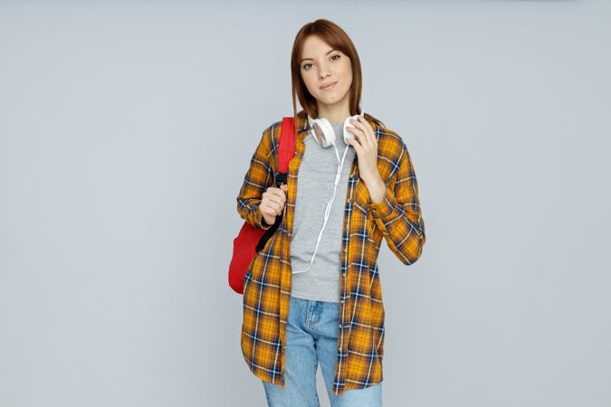 Concept of people, student woman on light gray background