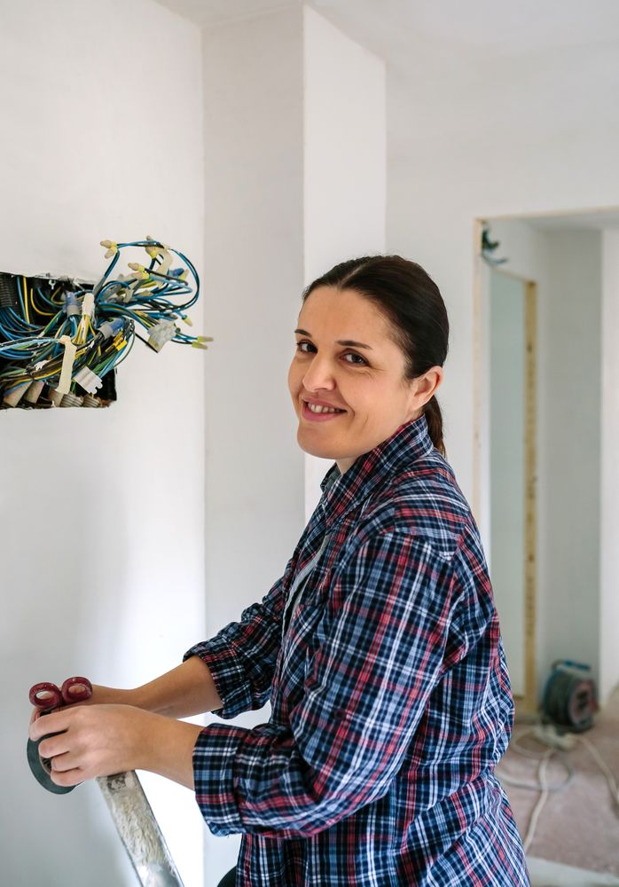 Electrician working on the electrical installation of a house