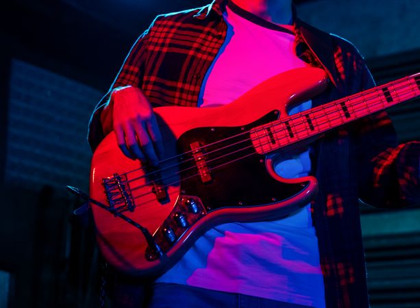 Young Musician Playing The Bass In A Live Concert