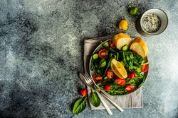 Fresh organic salad with spinach with copy space