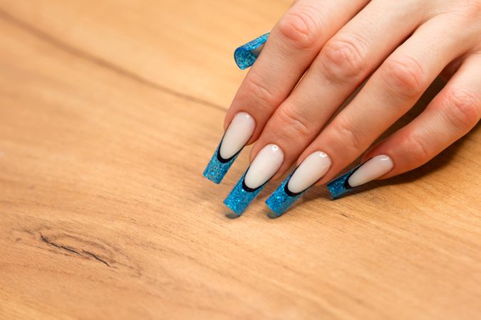 Chic Nail Art on Wooden Surface