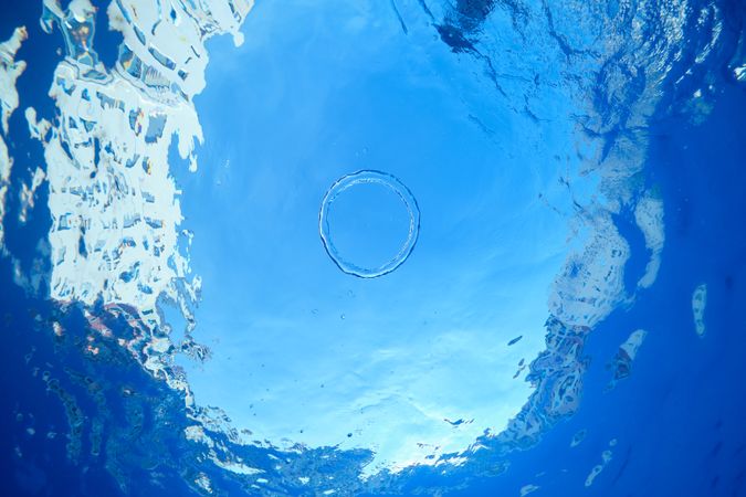 Blue clear water with air ring