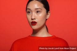Korean female model with red top and lipstick 0LrRA4