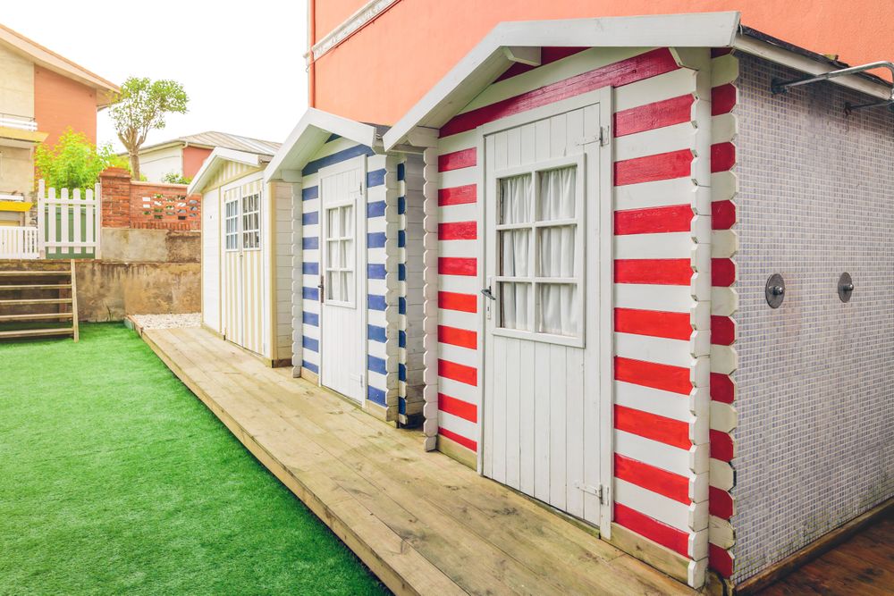 Beach striped huts in a home garden