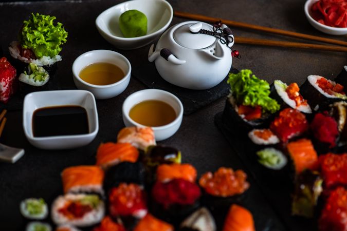 Sushi platter served with tea