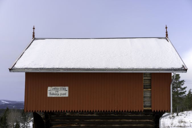 Red Norwegian hut in winter time