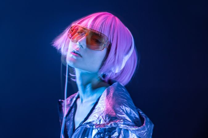 Trendy woman listening music with headphone