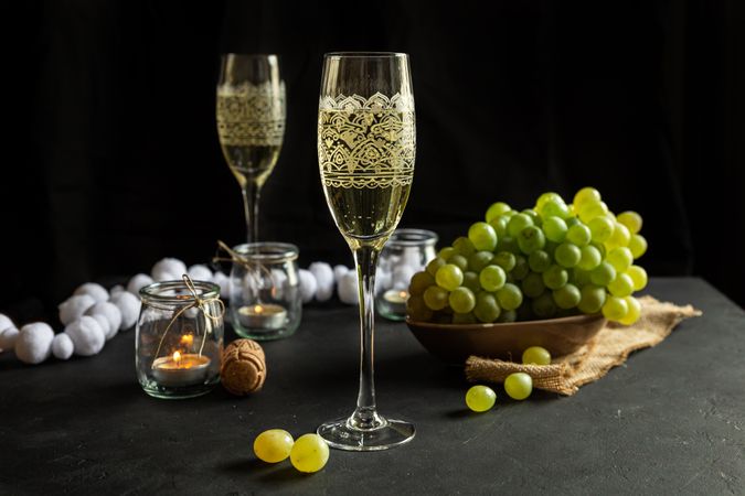 Glasses with wine and grapes