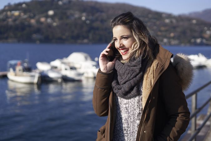 Young woman talking on the phone outdoors