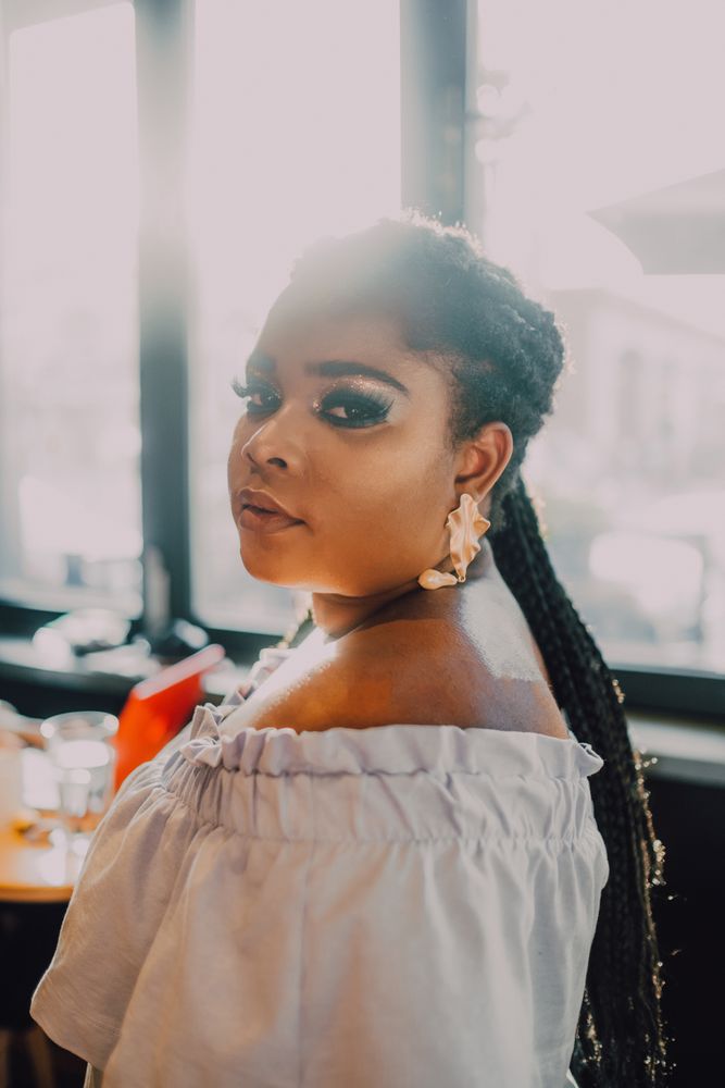 Headshot of confident trendy Black woman