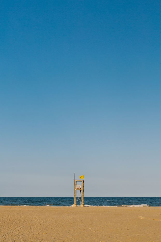 Observation tower at empty seashore
