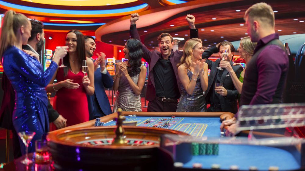 Cinematic Footage of People Taking Risks and Placing Bets on a Roulette Wheel in a Casino.