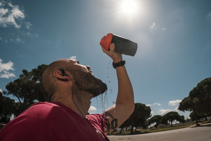 Man drinking during training