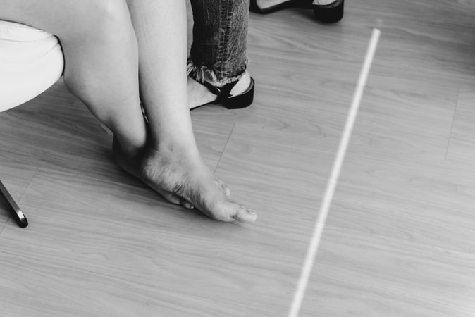 Woman legs on floor