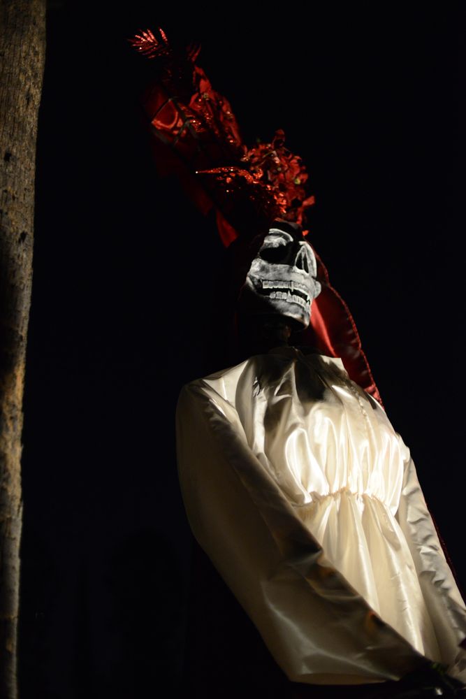 Tall Day of the Dead paper mache sculpture of woman skeleton